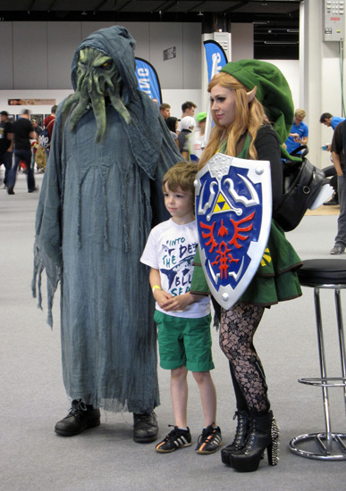 Cosplayer Link from the Legend of Zelda and H.P. Lovecraft’s Cthulhu.